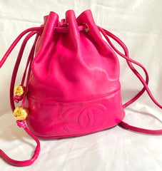 Vintage CHANEL fusia pink lambskin hobo bucket shoulder bag with CC golden balls and CC stitch mark. 050919ac1