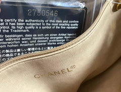 Vintage CHANEL taupe grey canvas and lambskin shoulder tote bag with gold tone chain straps and a CC ball charm. 070125ap1