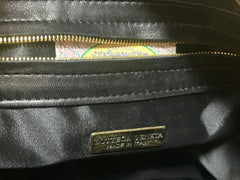 Vintage Bottega Veneta black intrecciato woven leather handbag with metal combo handles and a tassel. Rare masterpiece. 070822y1