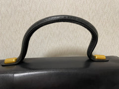 Vintage Bally black leather retro pop design bag, business purse with gold tone drawstrings and unique flap cut design.  Unisex use. 160315