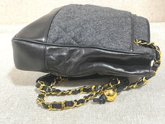 Vintage CHANEL taupe grey canvas and lambskin shoulder tote bag with gold tone chain straps and a CC ball charm. 070125ap2