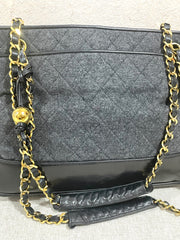 Vintage CHANEL taupe grey canvas and lambskin shoulder tote bag with gold tone chain straps and a CC ball charm. 070125ap2