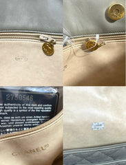 Vintage CHANEL taupe grey canvas and lambskin shoulder tote bag with gold tone chain straps and a CC ball charm. 070125ap1