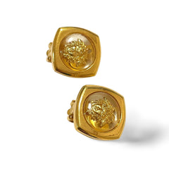 Vintage Gianni Versace clear and gold tone medusa face motif earrings. Classic jewelry. 060305m