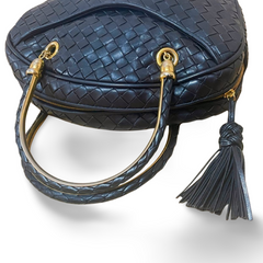 Vintage Bottega Veneta black intrecciato woven leather handbag with metal combo handles and a tassel. Rare masterpiece. 070822y1