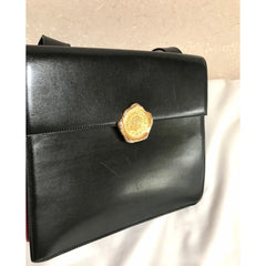 Vintage Karl Lagerfeld red and black double face shoulder bag with golden logo motifs. Rare unique bag. Must have.