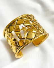 Vintage Chanel cutout logo bangle with matelasse design. Must have gorgeous jewelry. 050820ac1