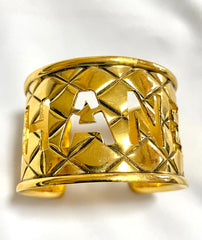 Vintage Chanel cutout logo bangle with matelasse design. Must have gorgeous jewelry. 050820ac1