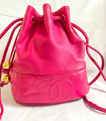 Vintage CHANEL fusia pink lambskin hobo bucket shoulder bag with CC golden balls and CC stitch mark. 050919ac1