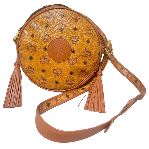 Vintage MCM brown monogram round Suzy Wong shoulder bag with brown leather trimmings. Designed by Michael Cromer. Unisex. 070325ac4