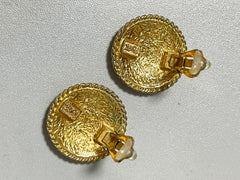 Vintage Yves Saint Laurent golden round logo earring with engraved signature. 0410132
