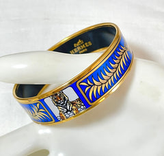 Vintage Hermes blue cloisonne enamel golden thick bangle, bracelet with tiger and leaves design in blue and gold. 070114ac3