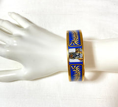 Vintage Hermes blue cloisonne enamel golden thick bangle, bracelet with tiger and leaves design in blue and gold. 070114ac3