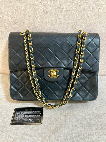 Vintage CHANEL black lambskin classic 2.55 double flap shoulder purse with golden chain straps. Make you even more chic. 061203ac1