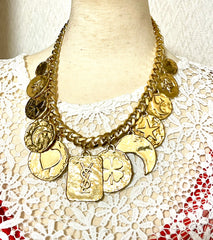 Vintage Yves Saint Laurent statement necklace with motif charms. Heart, moon, star, clover, bird, butterfly, and YSL logo. 060903ac2