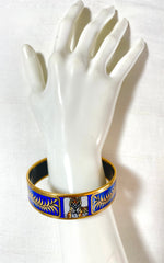 Vintage Hermes blue cloisonne enamel golden thick bangle, bracelet with tiger and leaves design in blue and gold. 070114ac3