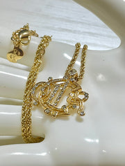 MINT. Vintage Christian Dior gold tone detailed design logo top necklace. Great vintage gift. 060625ac2