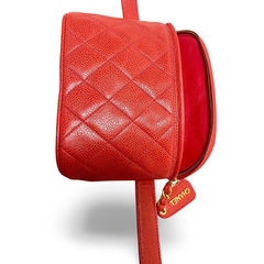 Vintage CHANEL red caviar leather waist bag, fanny pack purse with a matching leather belt and logo charm pull. 26” thru 28”. 070819ac2