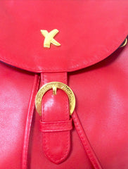 Vintage Paloma Picasso red leather backpack with golden logo motifs. Classic bag for unisex use. 060616r