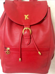 Vintage Paloma Picasso red leather backpack with golden logo motifs. Classic bag for unisex use. 060616r