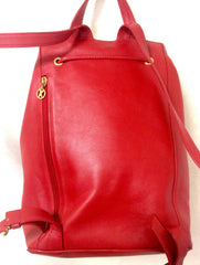 Vintage Paloma Picasso red leather backpack with golden logo motifs. Classic bag for unisex use. 060616r