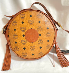 Vintage MCM brown monogram round Suzy Wong shoulder bag with brown leather trimmings. Designed by Michael Cromer. Unisex. 050524ra1