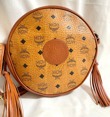 Vintage MCM brown monogram round Suzy Wong shoulder bag with brown leather trimmings. Designed by Michael Cromer. Unisex. 050524ra1