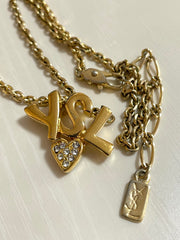 W3. Vintage Yves Saint Laurent golden YSL logo and heart crystal necklace. Must have jewelry piece. 050611ya