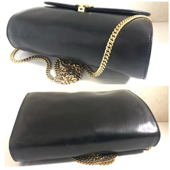 Vintage CELINE genuine black leather shoulder bag with gold and silver tone triomphe logo motif at front. Rare Celine leather bag.