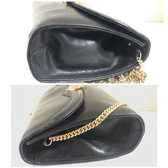 Vintage CELINE genuine black leather shoulder bag with gold and silver tone triomphe logo motif at front. Rare Celine leather bag.