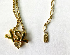 W3. Vintage Yves Saint Laurent golden YSL logo and heart crystal necklace. Must have jewelry piece. 050611ya