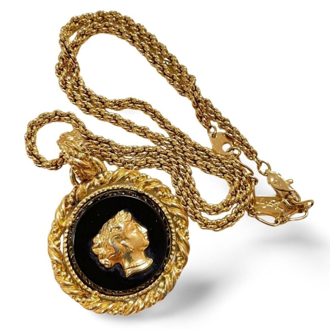 Vintage Yves Saint Laurent golden chain necklace with golden and black Queen cameo design pendant top. 060123ac7