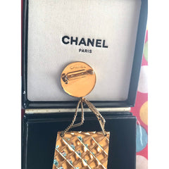 MINT. Vintage CHANEL Gold tone brooch with 2.55 classic purse and CC charms. Chic dangling brooch. Gorgeous masterpiece jewelry. 050406r4