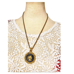 Vintage Yves Saint Laurent golden chain necklace with golden and black Queen cameo design pendant top. 060123ac7