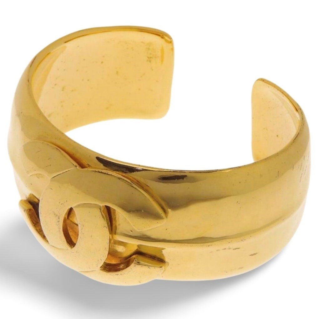 Vintage Chanel golden nice and heavy bangle with CC mark. Must have gorgeous jewelry. 060116k2