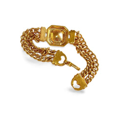 Vintage Lanvin double golden chain bracelet with gunmetallic glass stone. Made in Germany. 060326ac