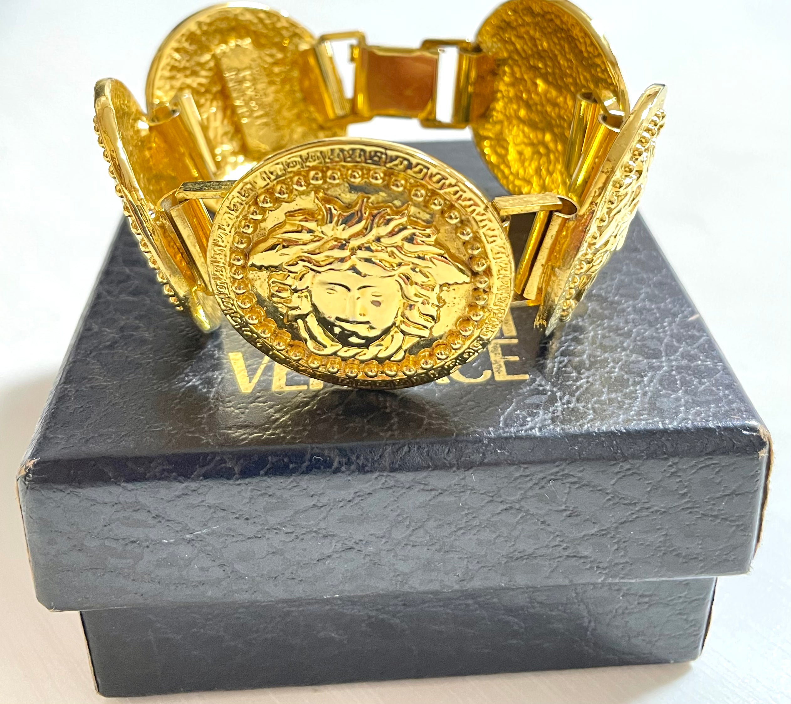 Vintage Gianni Versace gold tone medusa face motif bracelet. Must have Lady Gaga style jewelry piece. Great gift. 050525ra1