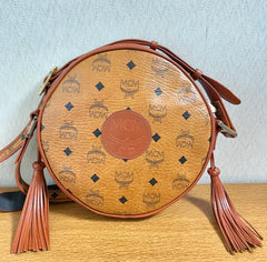 Vintage MCM brown monogram round Suzy Wong shoulder bag with brown leather trimmings. Designed by Michael Cromer. Unisex. 050715ya1
