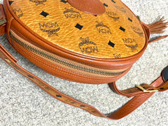 Vintage MCM brown monogram round Suzy Wong shoulder bag with brown leather trimmings. Designed by Michael Cromer. Unisex. 050715ya1