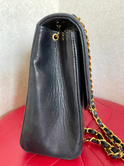 Vintage Chanel black lambskin chain 2.55 shoulder bag with gold chain. Unique hexagon shaped flap. 0407012