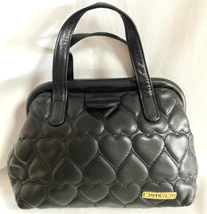 Vintage MOSCHINO black heart shape quilted lambskin mini handbag, tote purse. Too cute to carry.