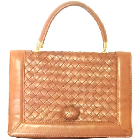 Vintage Bottega Veneta intrecciato brown woven lambskin handbag with matching turn-lock closure.