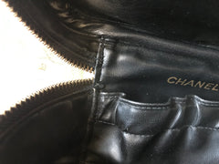 Vintage CHANEL calfskin classic cosmetic and toiletry black pouch, vanity bag with CC charm. Classic make up case.