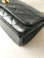 Vintage Chanel black leather 2.55 chain large shoulder bag with white trimming edge and a matching pouch. 0403284