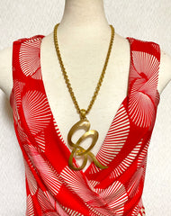 Vintage Sonia Rykiel golden chain necklace with large logo pendant top. Perfect vintage jewelry from SR. 0407152