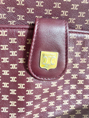 1980s. vintage Celine shoulder purse in bordeaux, burgundy leather with iconic blaison macadam print all over. riri zipper. 0411102