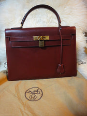 1980s Vintage HERMES Kelly 32 bag rouge ash box calf leather with gold hardware. Exterior stitch. Stamp K in O, 1981. Best known classic bag