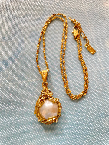 Vintage Yves Saint Laurent golden chain necklace with large faux pearl top. Arabesque frames. Opal shine elegant jewelry. 0409292