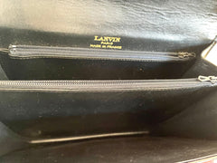 Vintage Lanvin black leather shoulder bag with iconic golden logo motif, Classic purse for daily use. 050222ya1