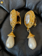 Vintage CHANEL oval shape and teardrop pearl dangle earrings with golden frames. Classic jewelry. 050113an2